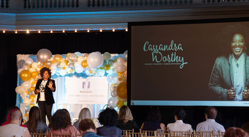 Speaker on stage at a Together Digital event
